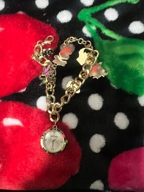 Gold Tone Charm Bracelet Watch with Floral Charms